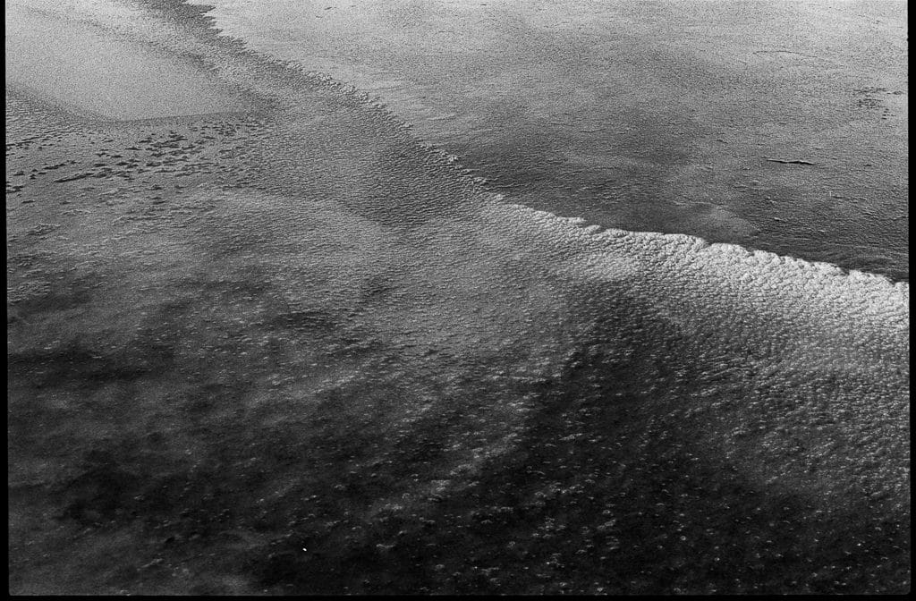 Frozen Lady Lake on the Central Plateau, Tasmania. Taken on Kodak Tmax 3200.